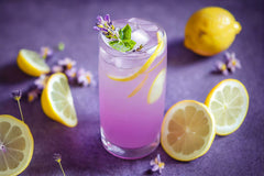 US Wellness Naturals Lavender Tea infusion being poured for a soothing beverage.