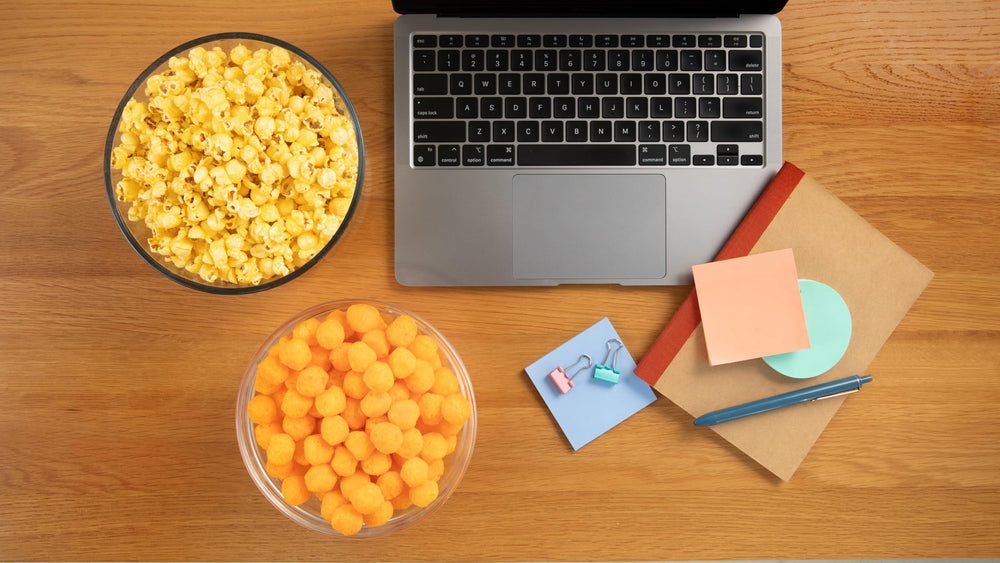 Family enjoying Utz Cheese Balls during movie night