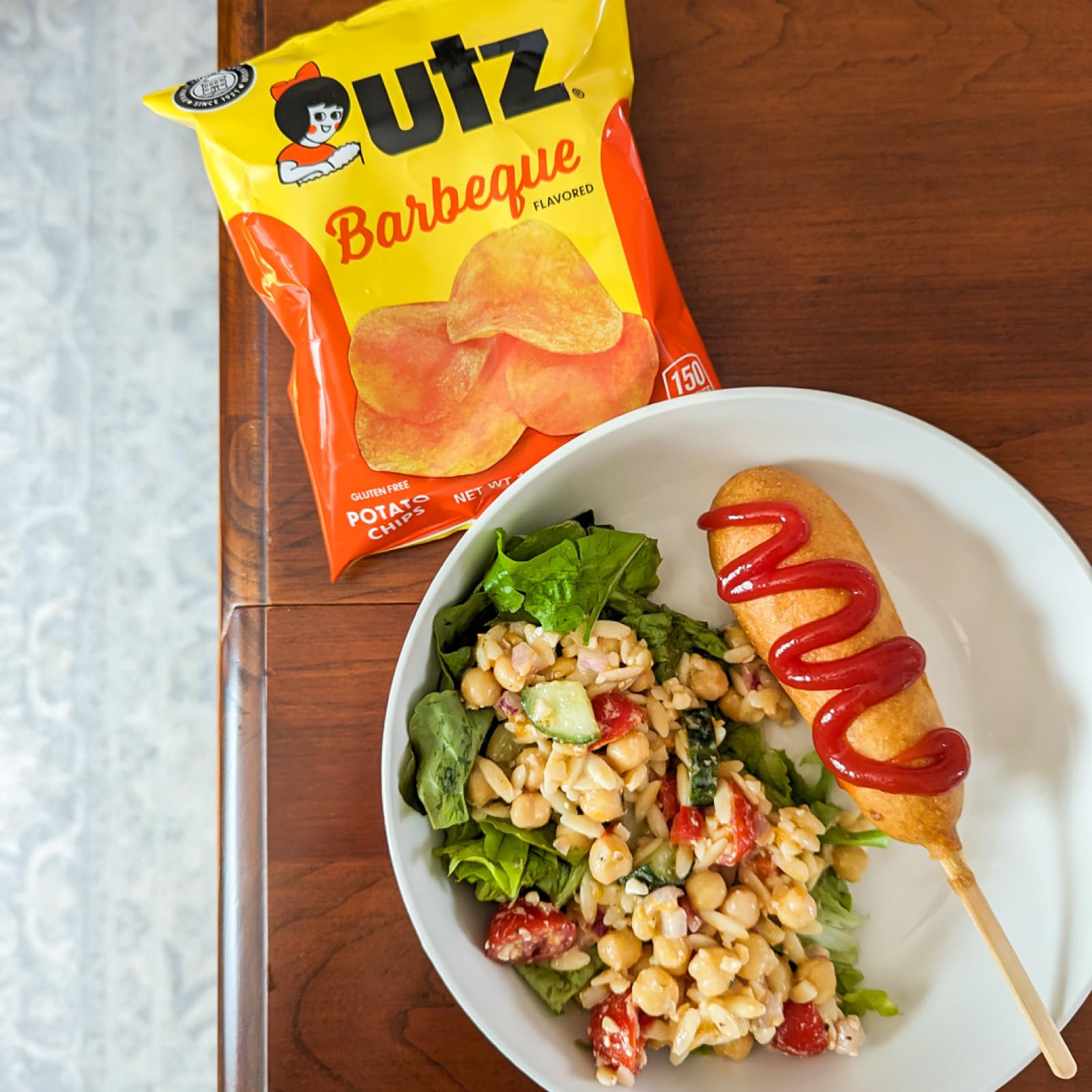 Utz White Cheddar Popcorn for lighter, flavorful snacking.