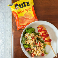 Utz White Cheddar Popcorn for lighter, flavorful snacking.