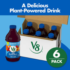 Pouring V8 Acai Mixed Berry into a glass for a refreshing treat