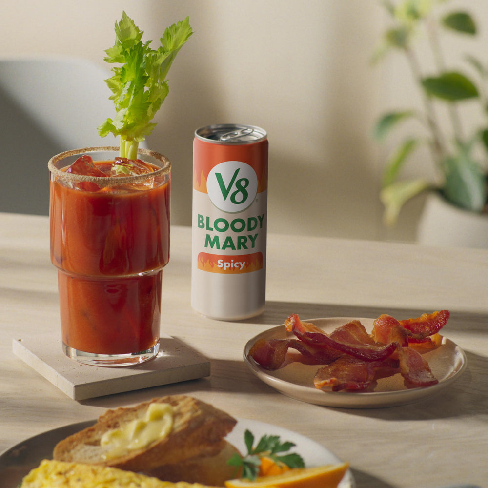 V8 Bloody Mary Spicy Mix glass with ice and garnish ready to serve.