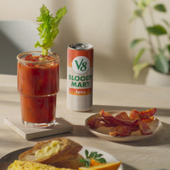 V8 Bloody Mary Spicy Mix glass with ice and garnish ready to serve.