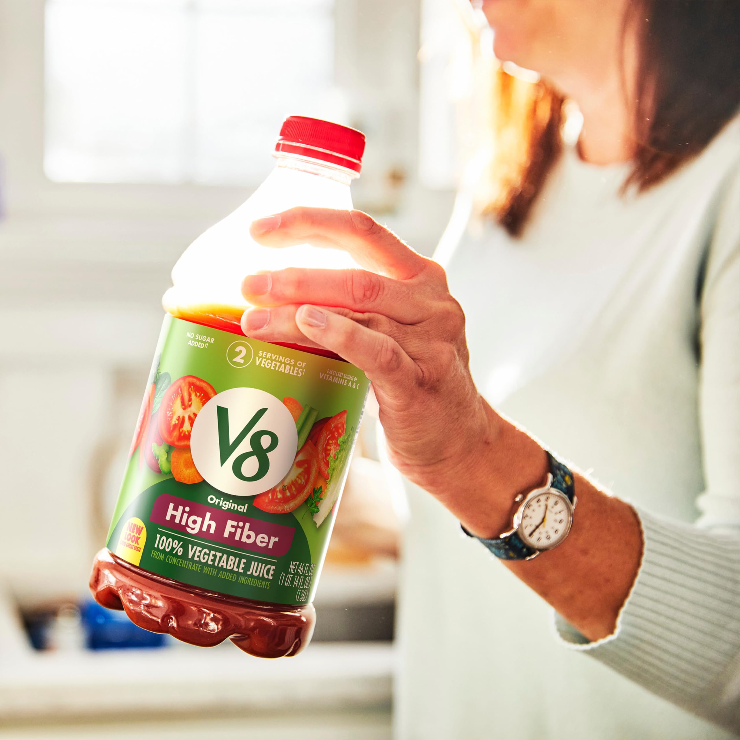 V8 High Fiber Original pour into recipe, versatile for soups or marinades.