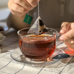 VAHDAM Assam Tea pyramid bag delivering bold, malty character.