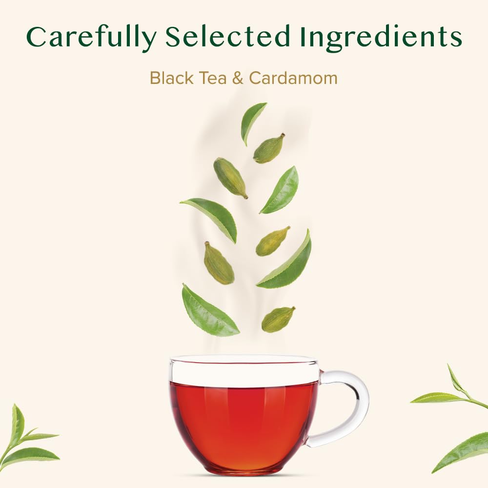 VAHDAM Cardamom Chai brewed cup steaming with spice aroma.