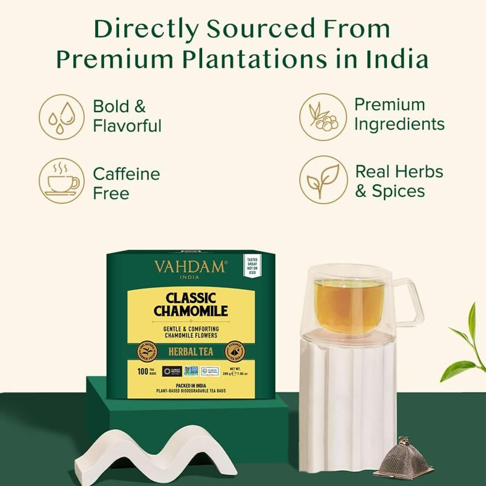 VAHDAM chamomile pyramid bag unfurling to release full flavor.