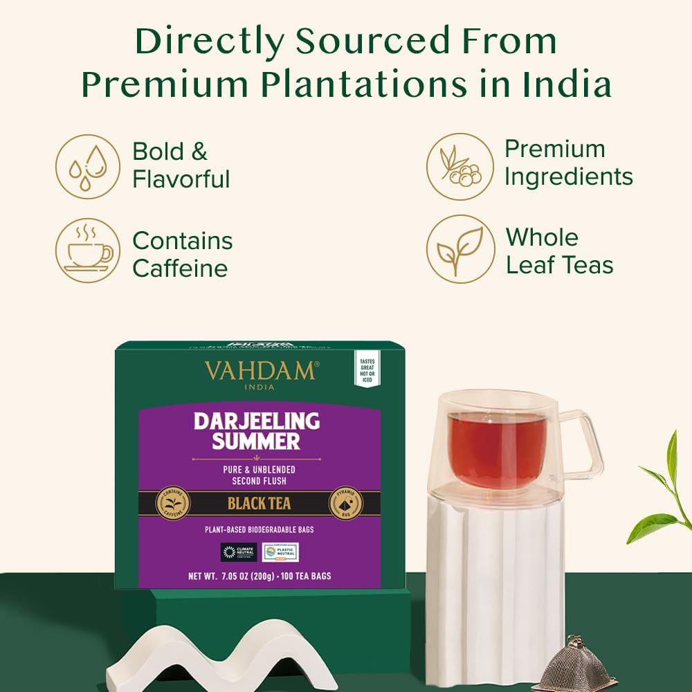 VAHDAM Darjeeling tea bags unfurling in pyramid bags for richer aroma.