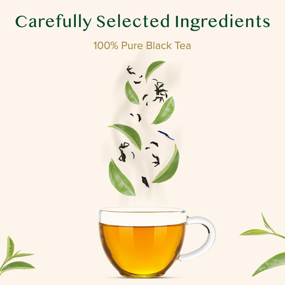 VAHDAM Darjeeling tea brewed in a cup releasing mellow aroma.
