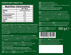 VAHDAM Ginger Mint Green Tea leaves steeping in a cup with steam