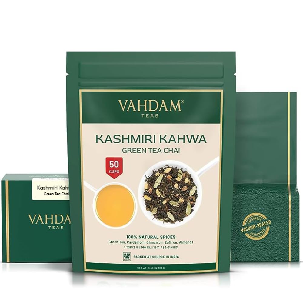 Steaming VAHDAM Kashmiri Kahwa cup shows saffron and almond notes.