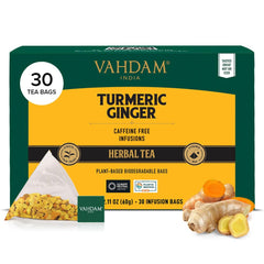 VAHDAM turmeric-ginger tea bag pyramid ready for a calming, caffeine-free cup.