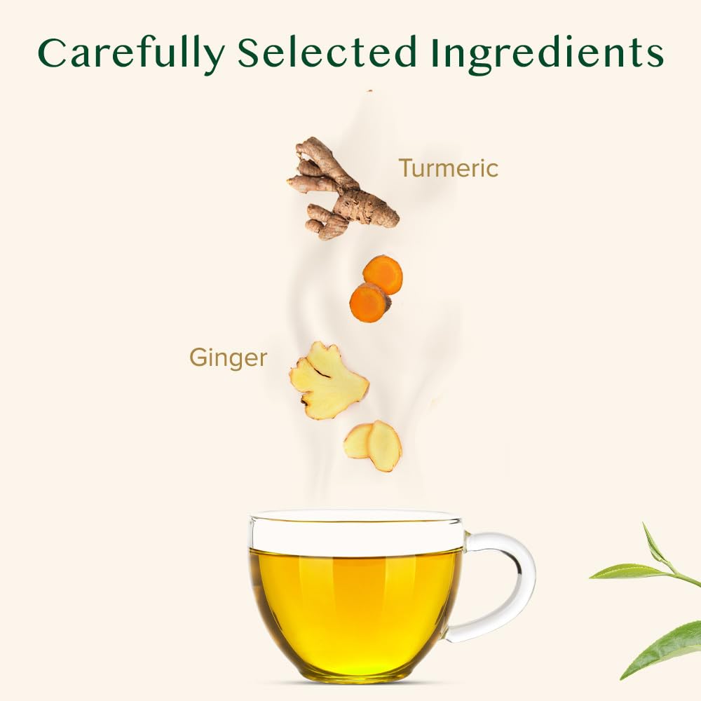 VAHDAM Turmeric Ginger Tea hot cup steam: inviting fragrance for a cozy evening.