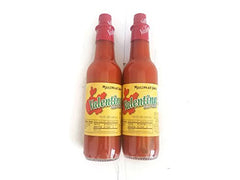 Valentina Mexican hot sauce bottle ready to top tacos and eggs.