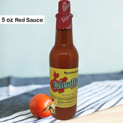 Valentina Salsa Red Hot Sauce bottle pouring for bright flavor.