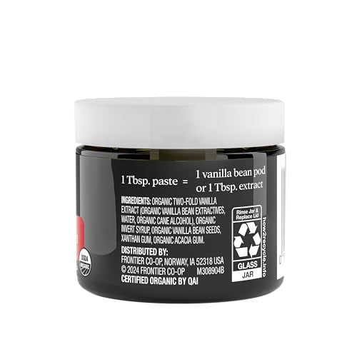 Close-up of vanilla bean paste reveals rich aroma and vanilla specks ideal for desserts.