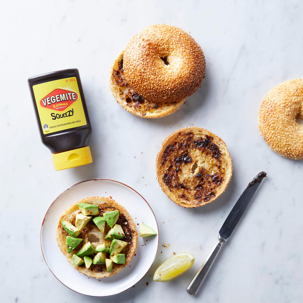 Sliced avocado toast with Vegemite Squeezy, rich umami.