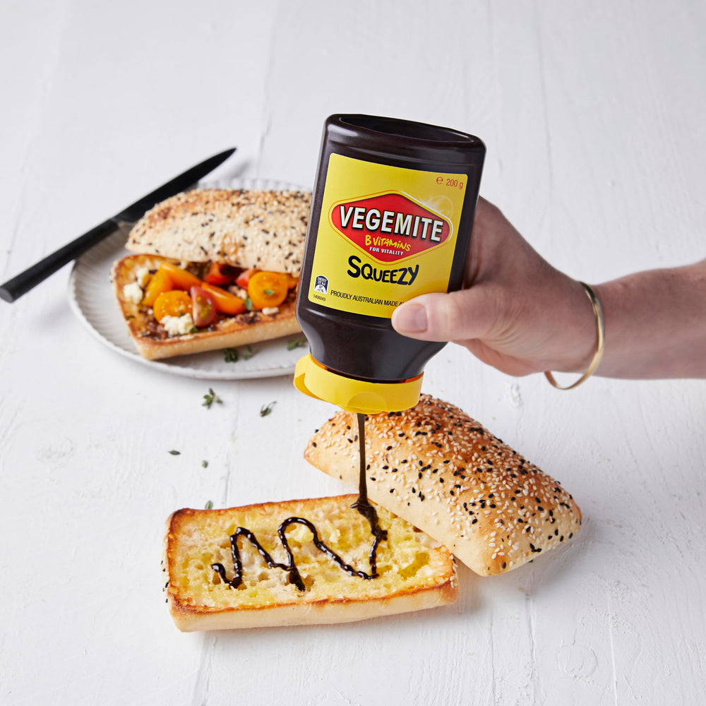 Australian-made Vegemite Squeezy in pantry with durable packaging.