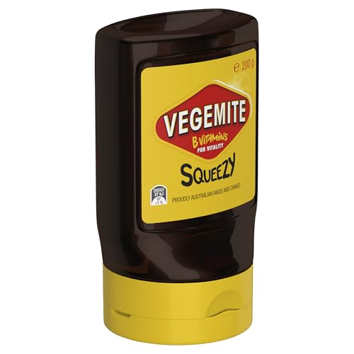Vegemite Squeezy bottle beside eggs, a versatile lunch option.
