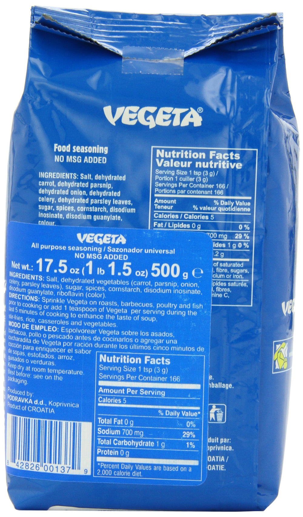Vegeta bottle pouring for quick flavor boosts in home cooking.