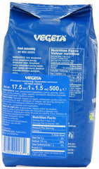 Vegeta bottle pouring for quick flavor boosts in home cooking.