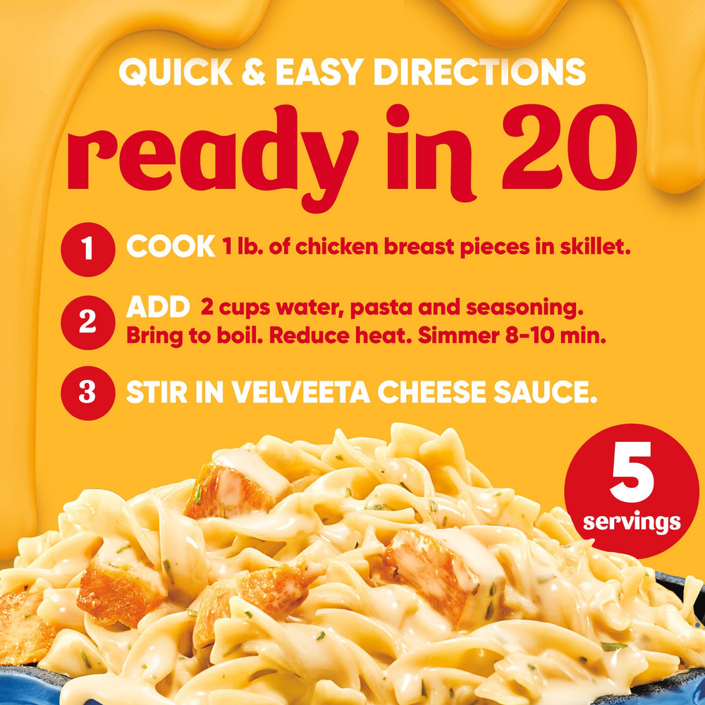 Velveeta Skillets Chicken Alfredo adding chicken to start the recipe.