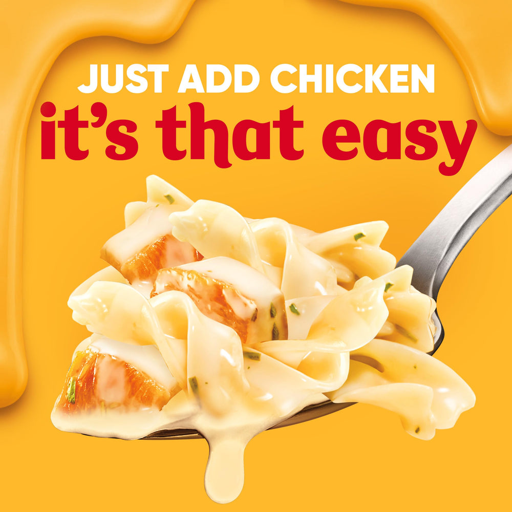 Velveeta Skillets Chicken Alfredo seasoning mix adds flavor to creamy sauce.