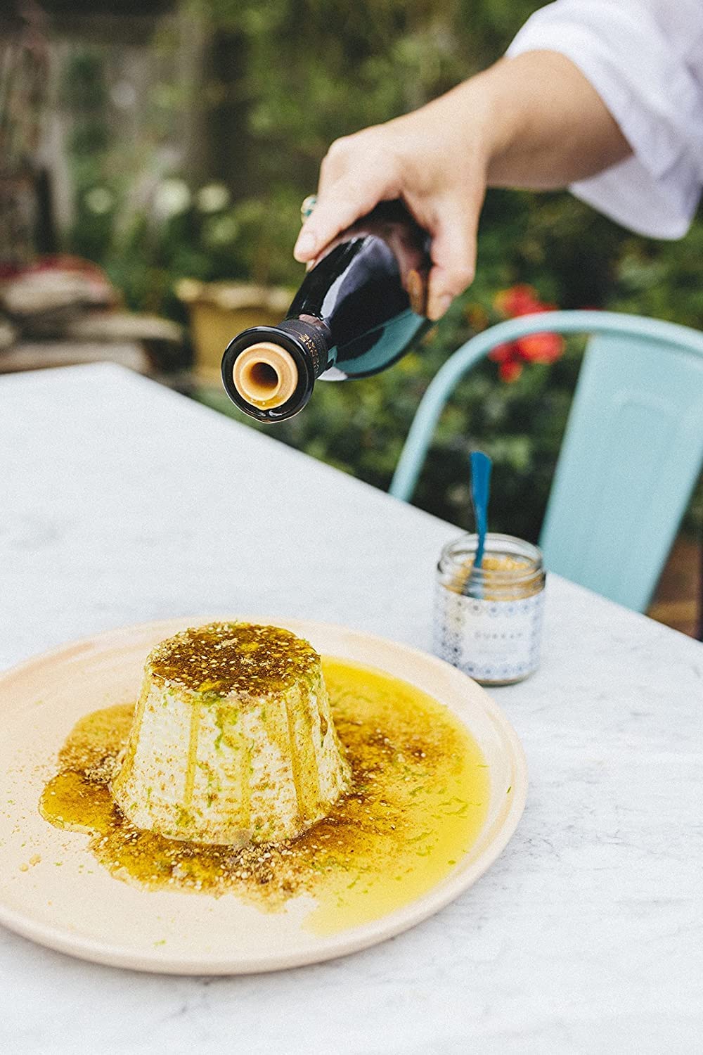 Villa Jerada Dukkah over dips and veggies for a flavorful bite.