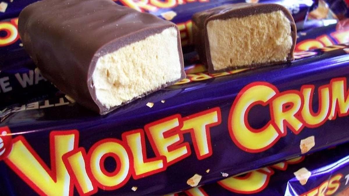 Violet Crumble bar break shows honeycomb crunch for a satisfying bite