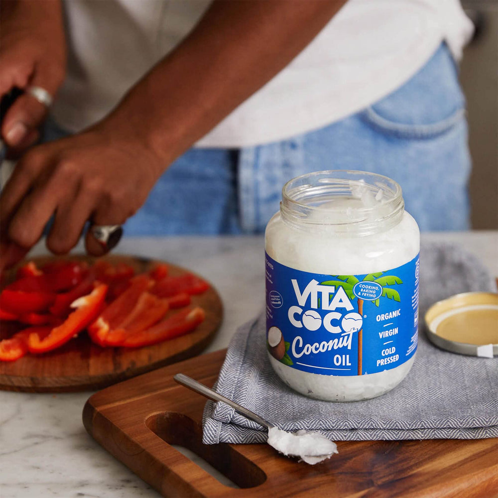 Vita Coco coconut oil stored in a kitchen cabinet, ready for cooking and DIY skincare.