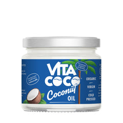 Vita Coco extra virgin coconut oil bottle 250ml on shelf, a versatile pantry staple.