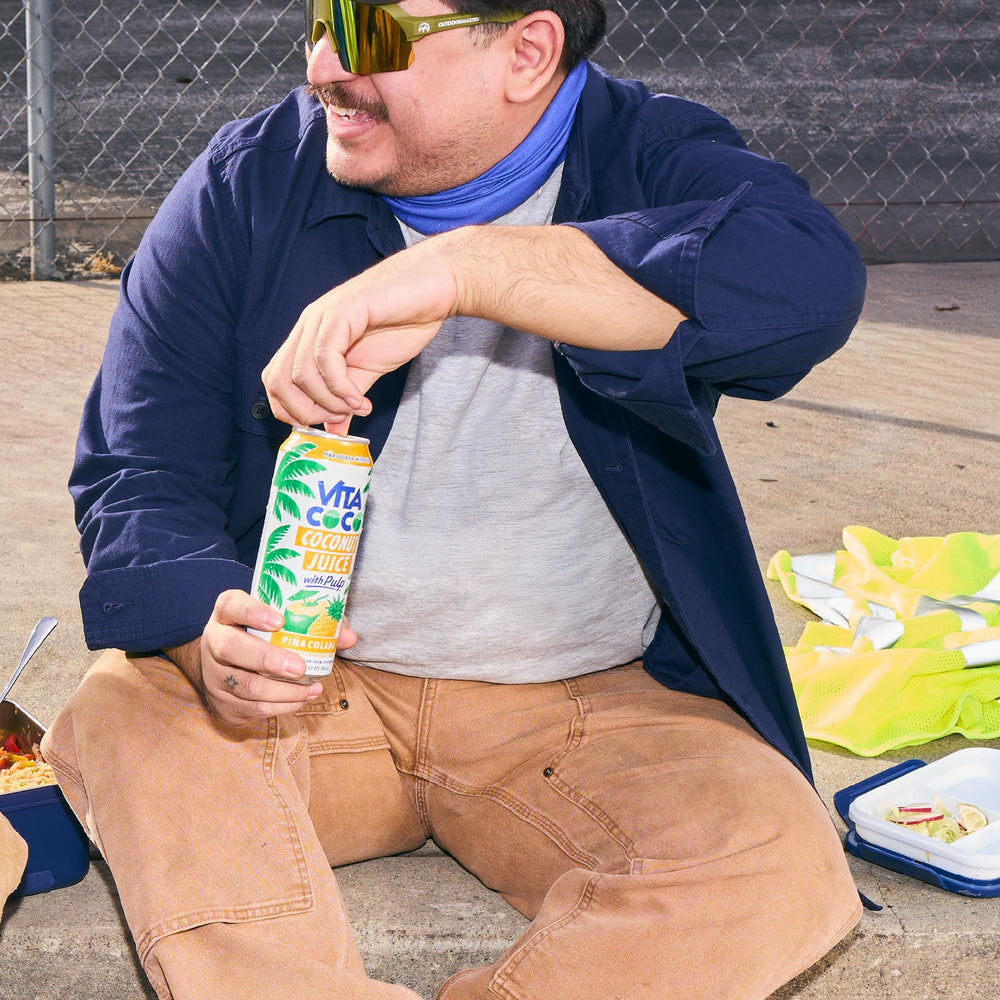 Vita Coco Pina Colada Juice on-the-go bottle for quick tropical flavor.