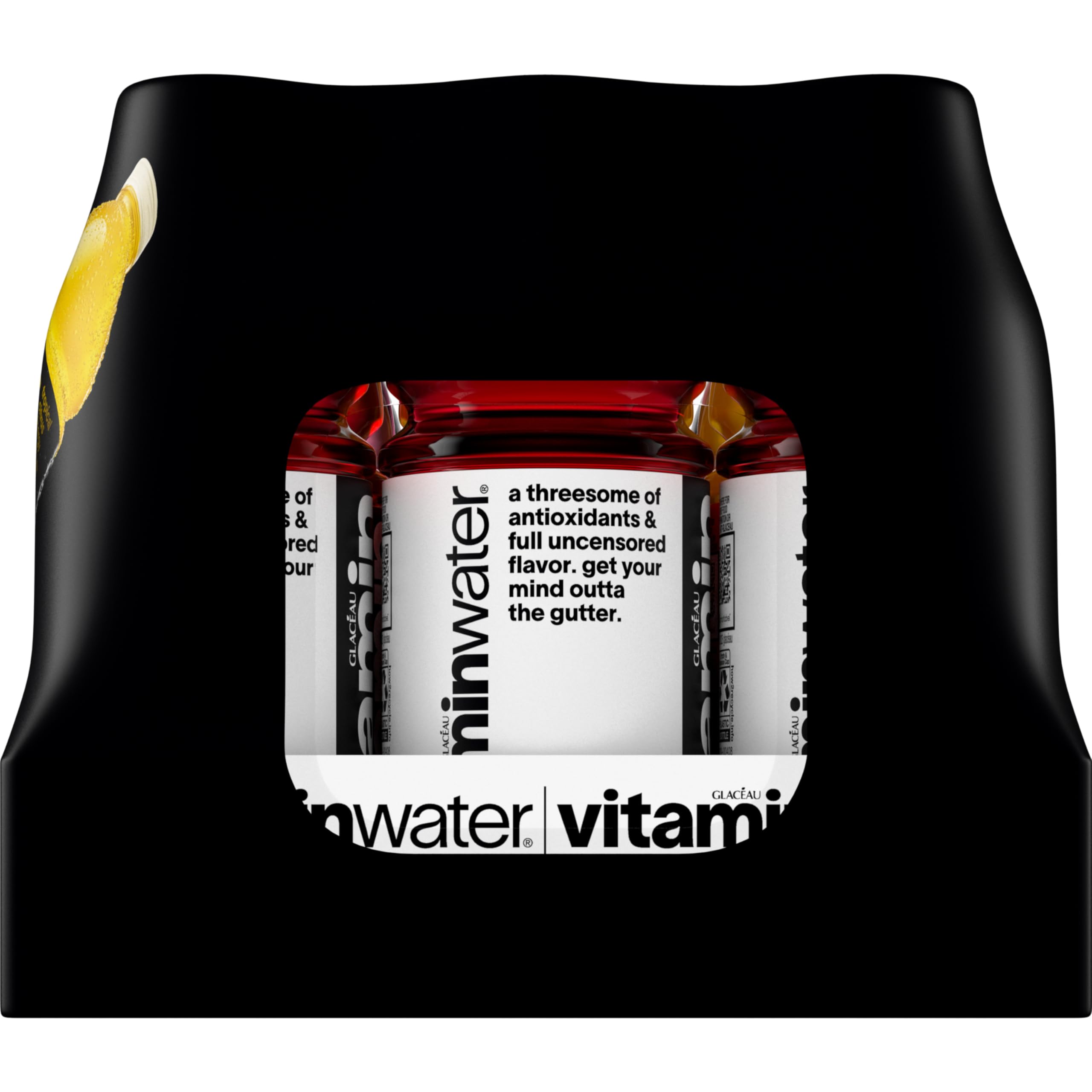 Vitaminwater bottles in a refrigerator display a convenient 12-pack option.