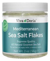 Viva Doria Mediterranean sea salt flakes bottle close-up shows delicate crystals for finishing dishes.