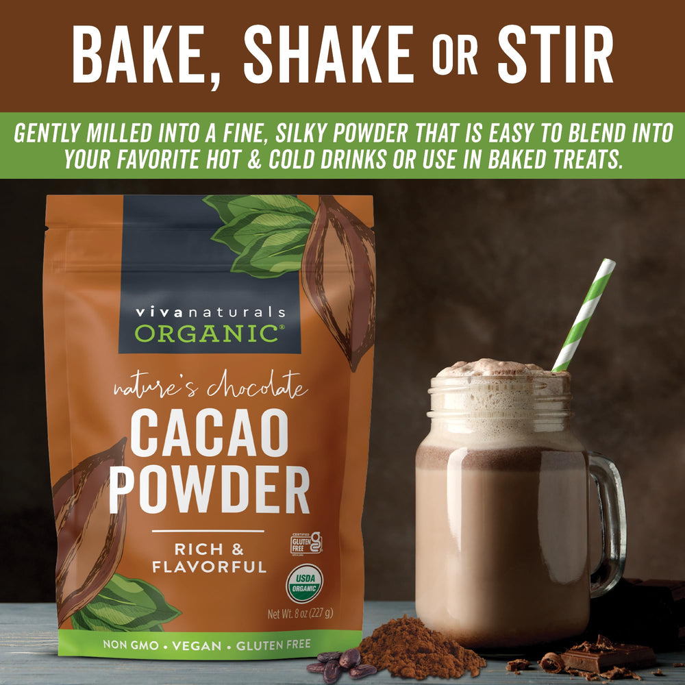 Viva Naturals Organic Cacao Powder in a smoothie glass adds depth and flavor.
