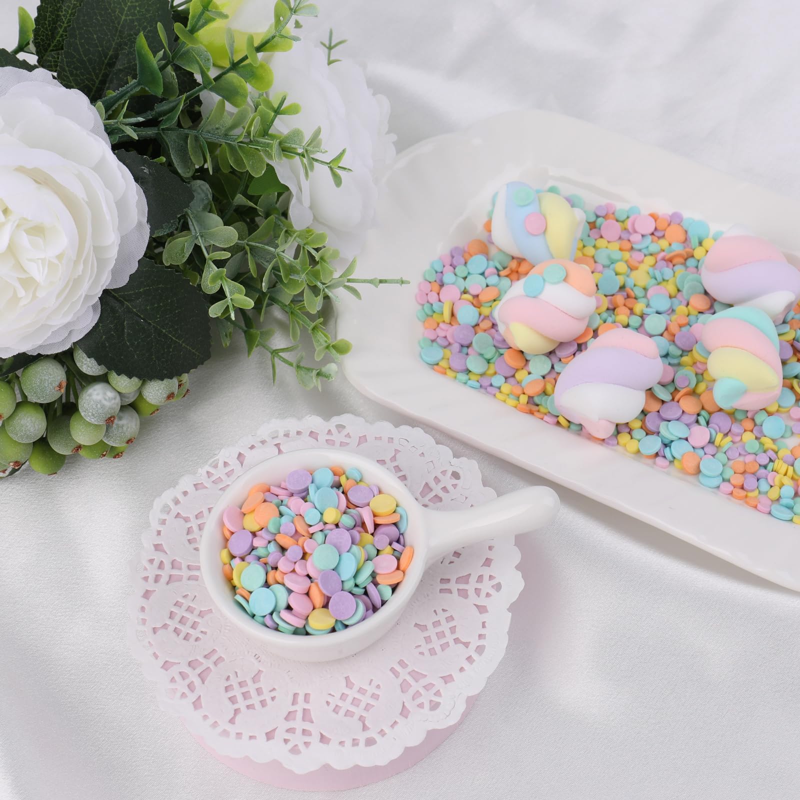 VoKaSar cupcakes topped with pastel confetti sprinkles for celebration.