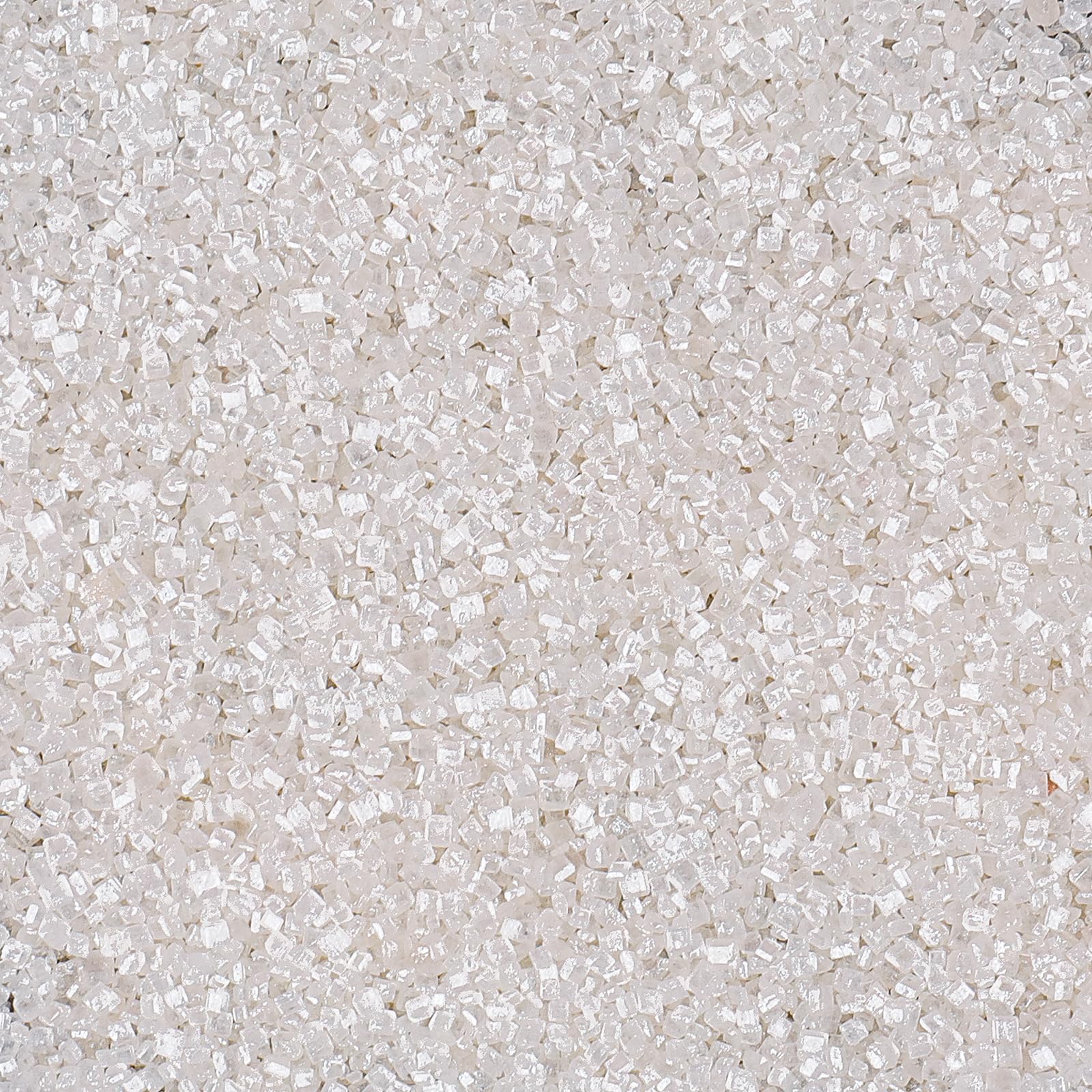 VoKaSar white sanding sugar 130g pack adds sparkling decoration to cakes.
