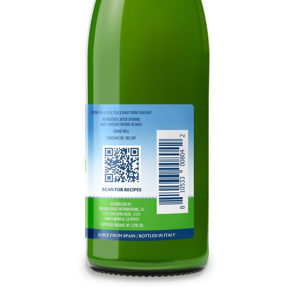 Volcano Juice Lime bottle with lime fruits signaling fresh organic ingredients