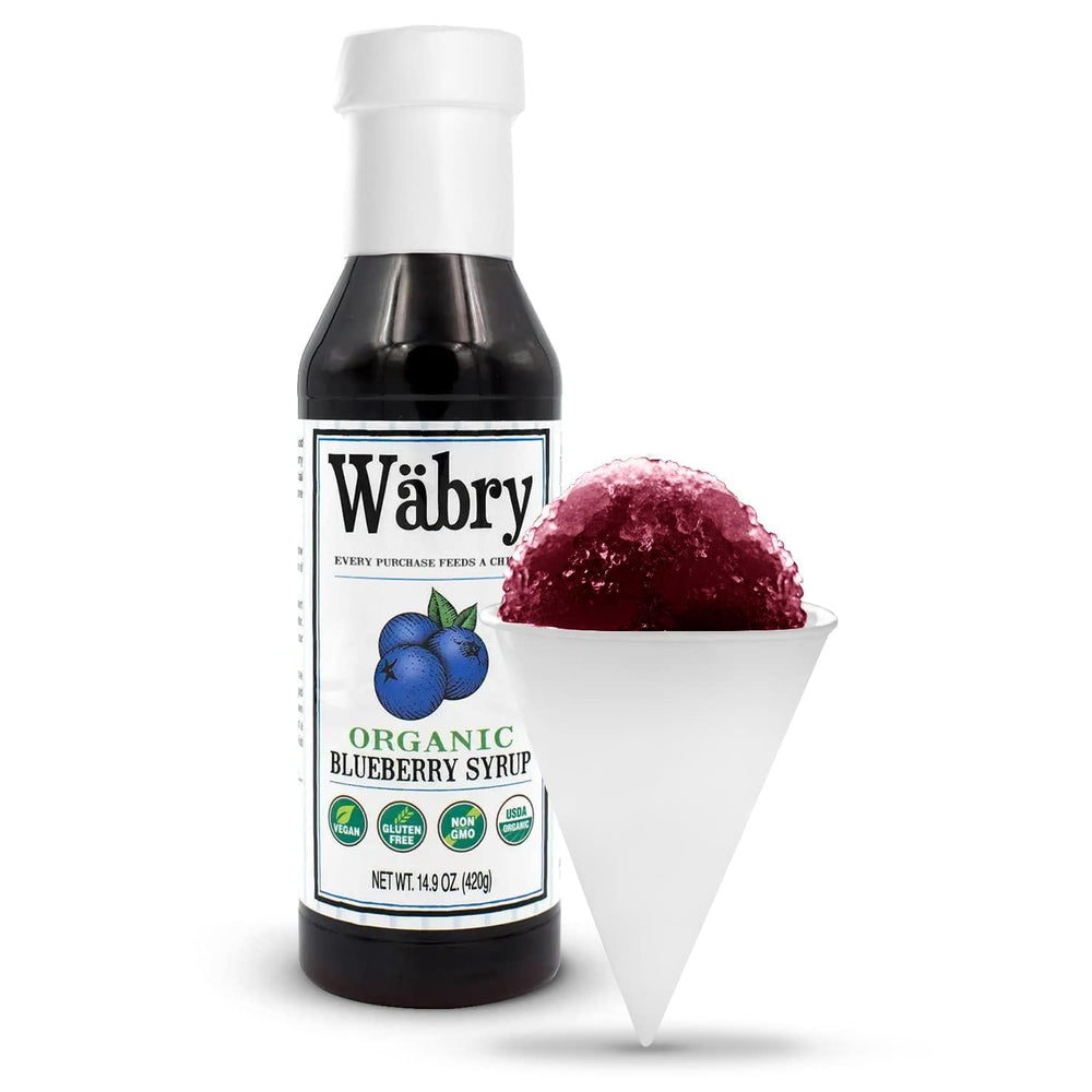 Wäbry Blueberry Syrup drizzle on a snow cone with vibrant color