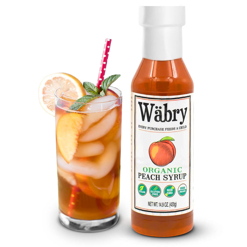 Wäbry Peach Syrup drizzle over waffles for a fruity crunch.