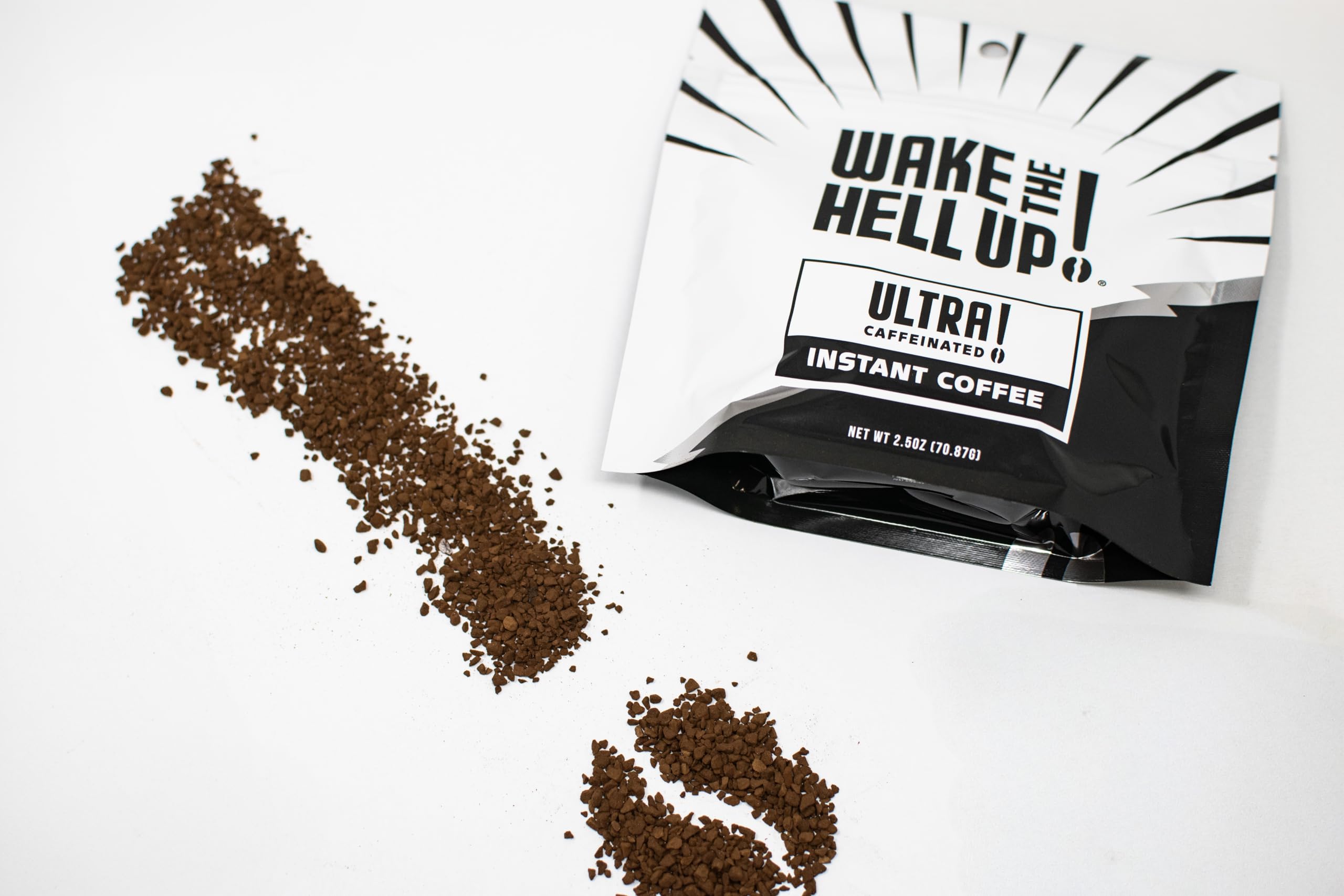 Wake The Hell Up! instant coffee powder dissolving quickly for rapid hot or cold beverages.