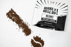 Wake The Hell Up! instant coffee powder dissolving quickly for rapid hot or cold beverages.