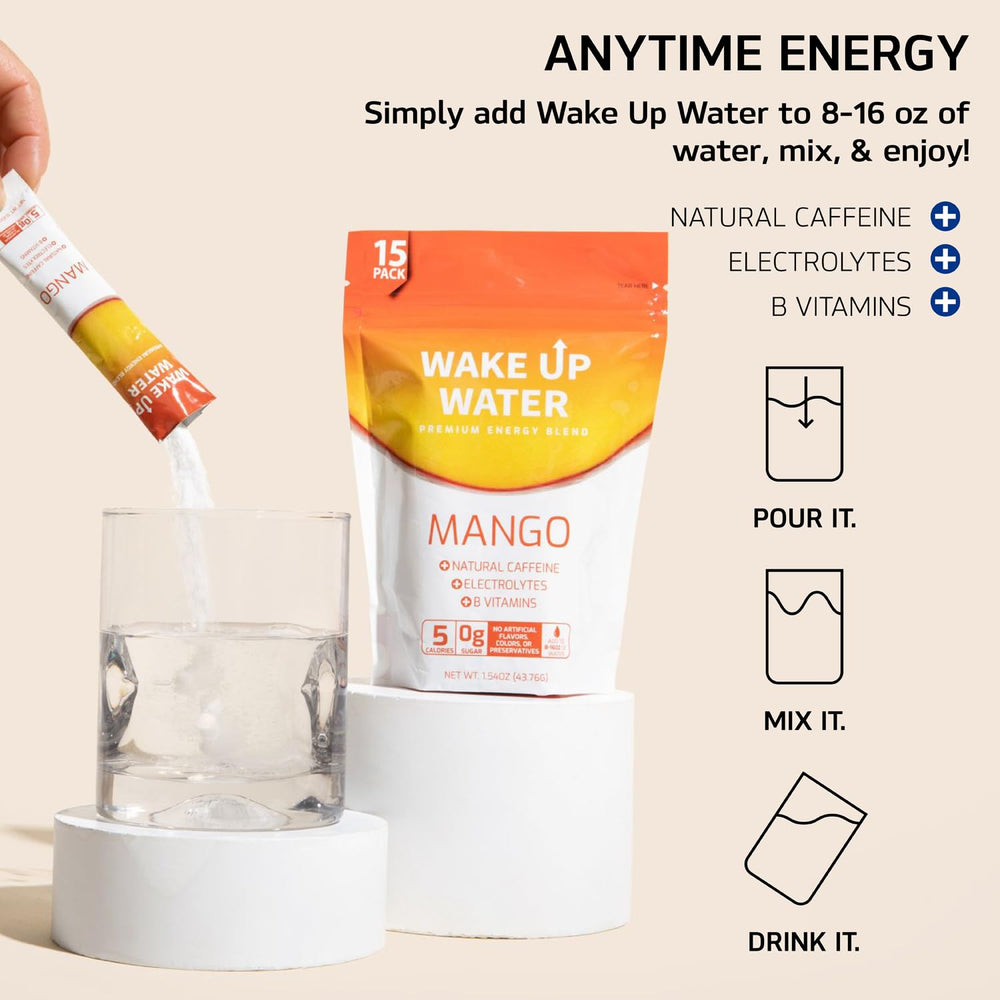 Wake Up Water Mango bottle on desk ready to refresh.