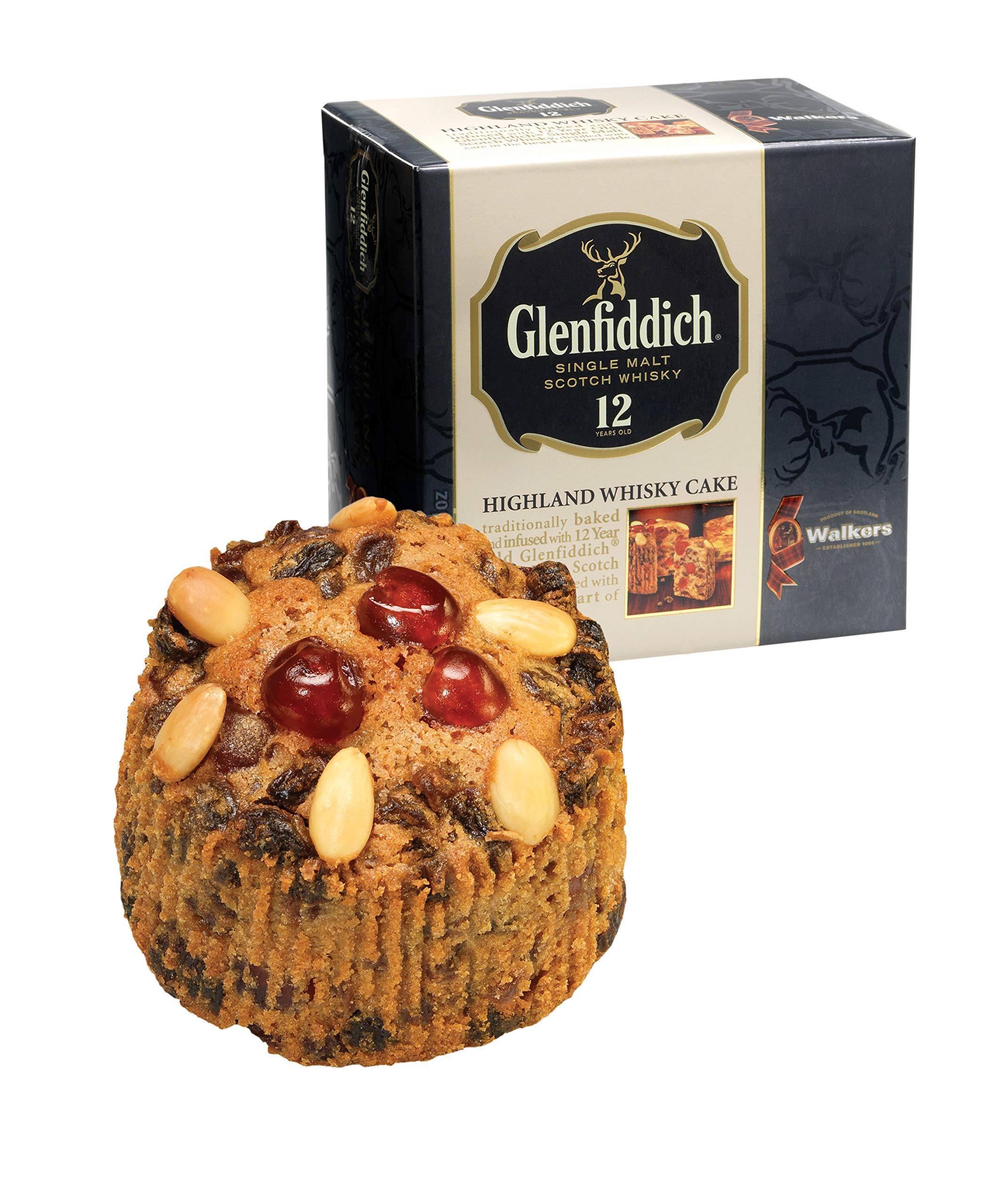 Walkers Highland Whisky Cake being cut for festive sharing.