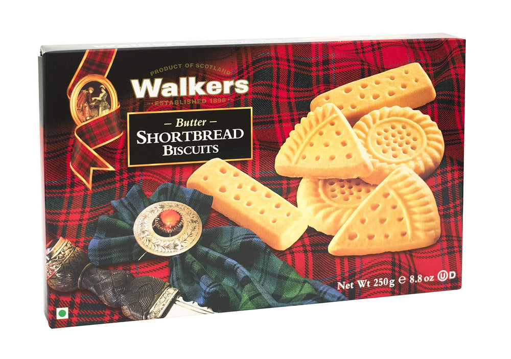 Walkers shortbread assorted box open, reveals buttery layers and crumbly textures.