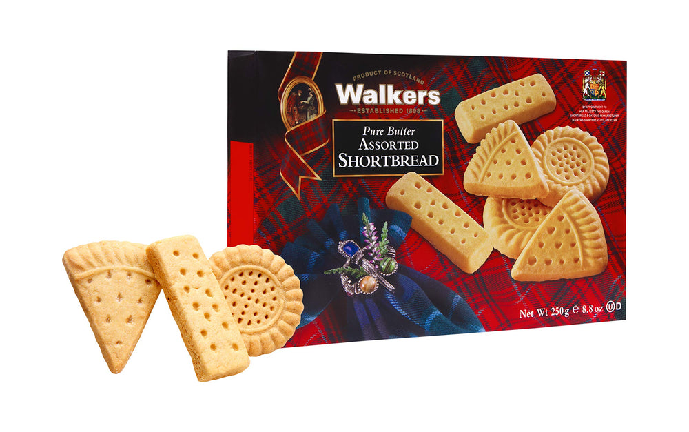 Walker's Shortbread rounds cookies beside a cup for snacking.