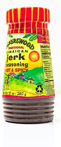 Walkerswood Jerk Seasoning being poured over chicken for grilling