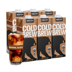 Wandering Bear bottle pour shows bold, smooth straight black cold brew.