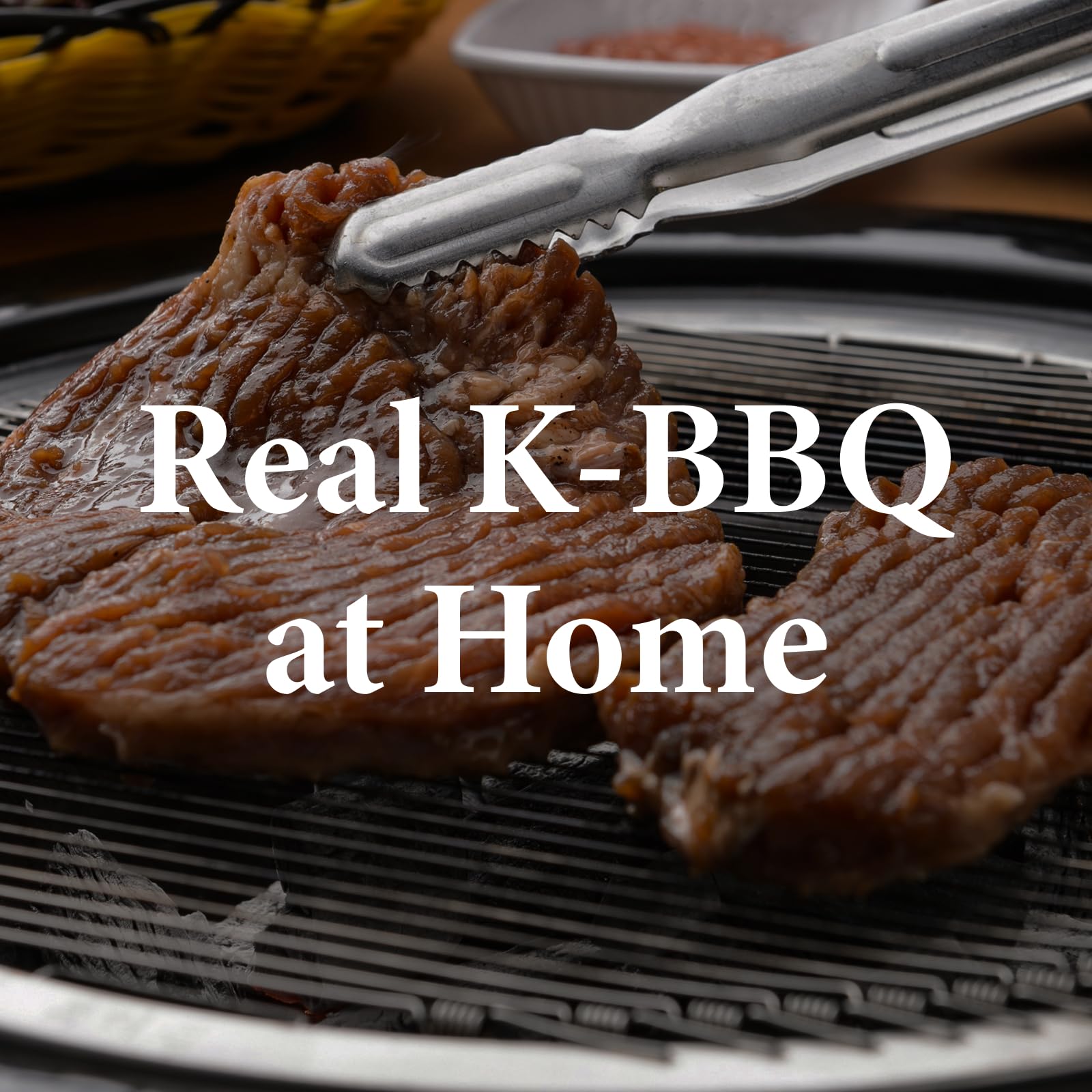 Wang Galbi Marinade on grill with sizzling meat.