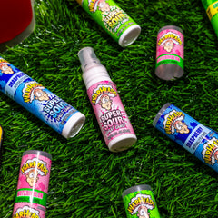 Closeup of replaceable cap on Warheads Sour Spray highlighting portability and mess-free use
